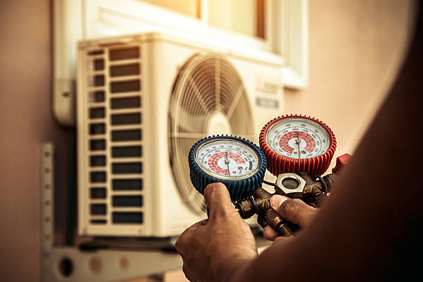 Professional Ac Repair technician working in De Soto, IA